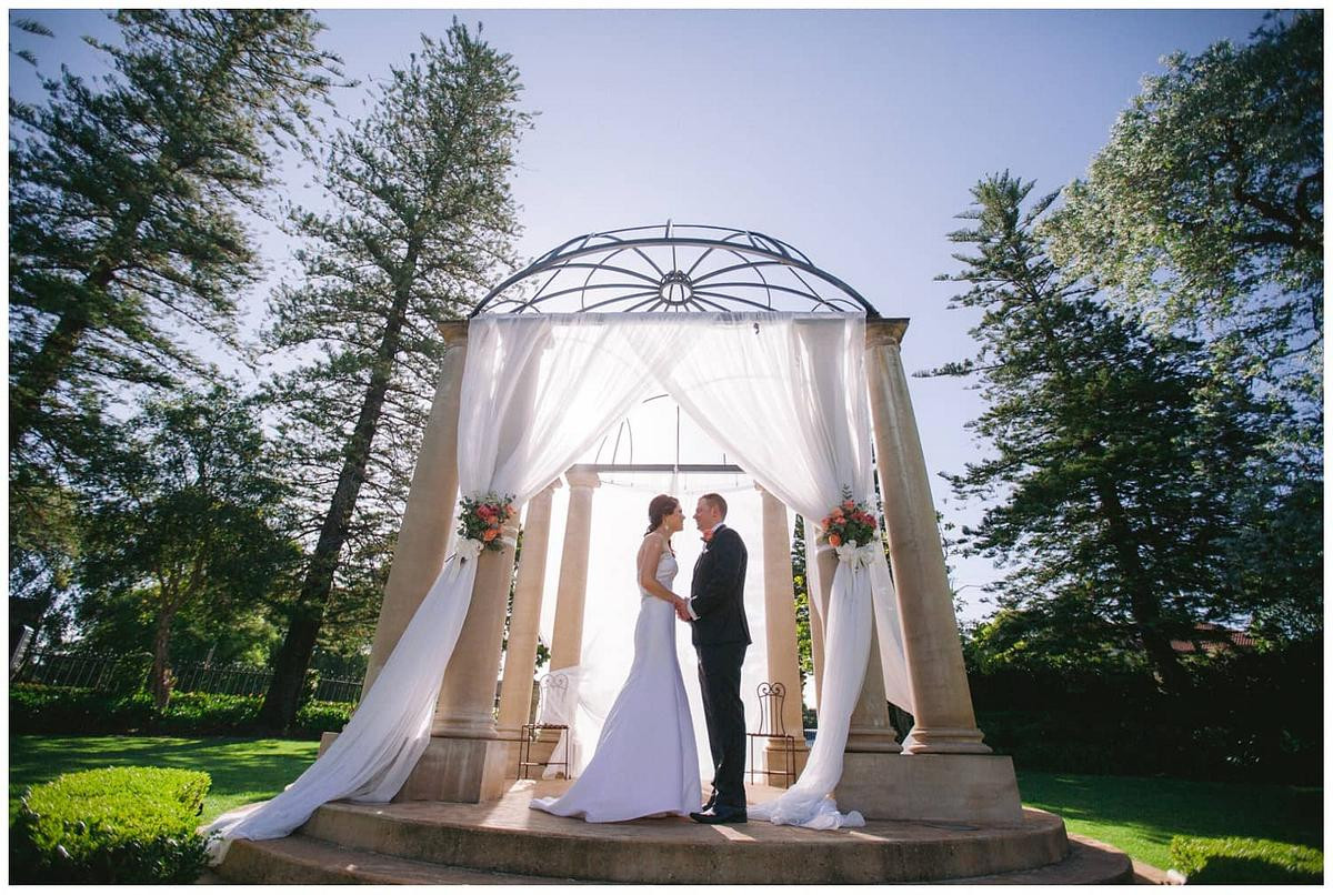 Dreamy wedding photography capturing the couple under soft light at Garden Chateau Curzon Hall..