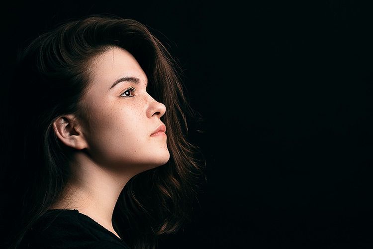 Girl in Black Background - Studio Portrait